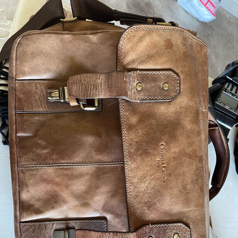 Worn mens leather briefcase